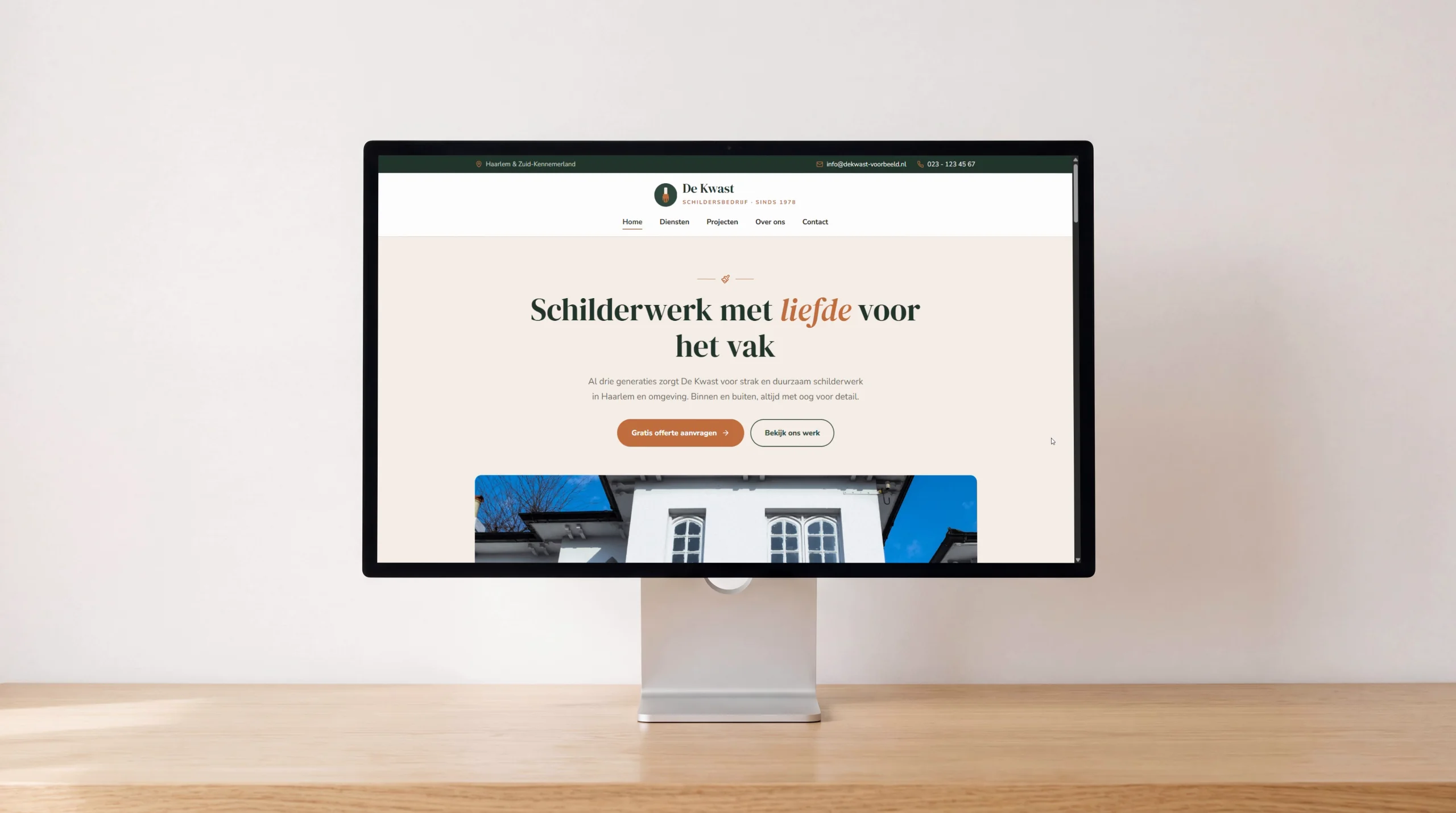 The homepage of Schildersbedrijf De Kwast on an iMac